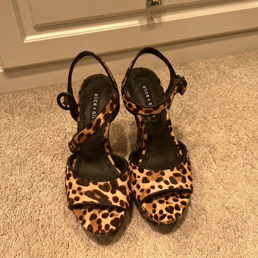 Brand new Alice and Olivia leopard platform sandal.  Never worn.  5 inch heel